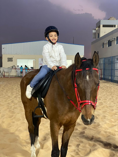 أكاديمية رواد الفرسان لتعليم ركوب الخيل - Buraydah Saudi Arabia|طريق عمر ابن الخطاب|، الدائري|CW79+C39